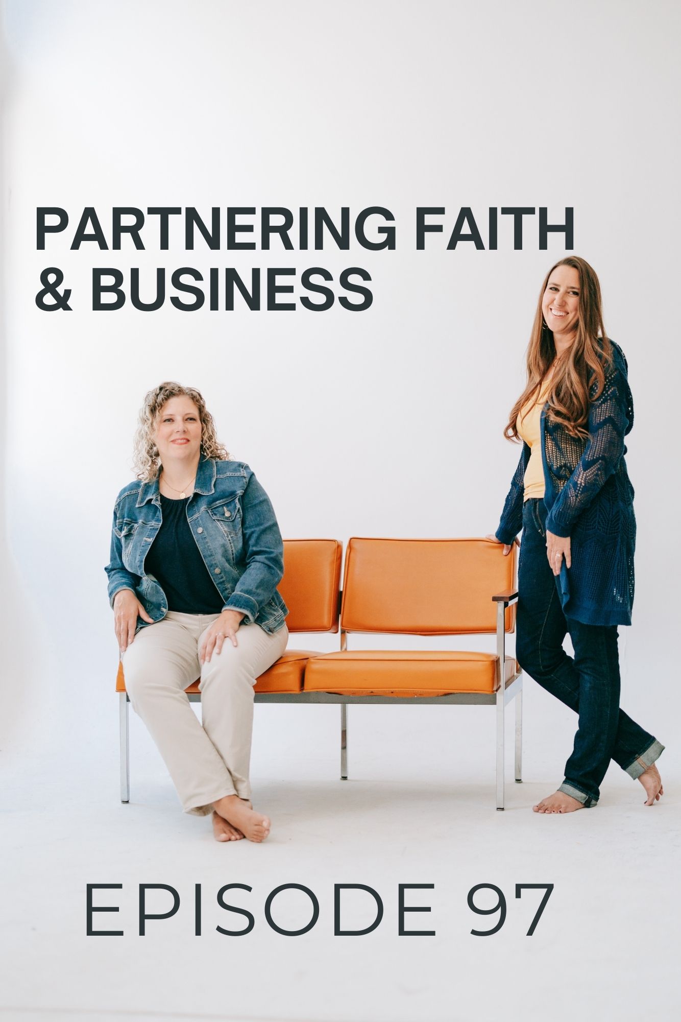 Two Christian women business owners and podcasters stand on either side of an orange couch discussing how to partner faith and business for their Christian business podcast for women.